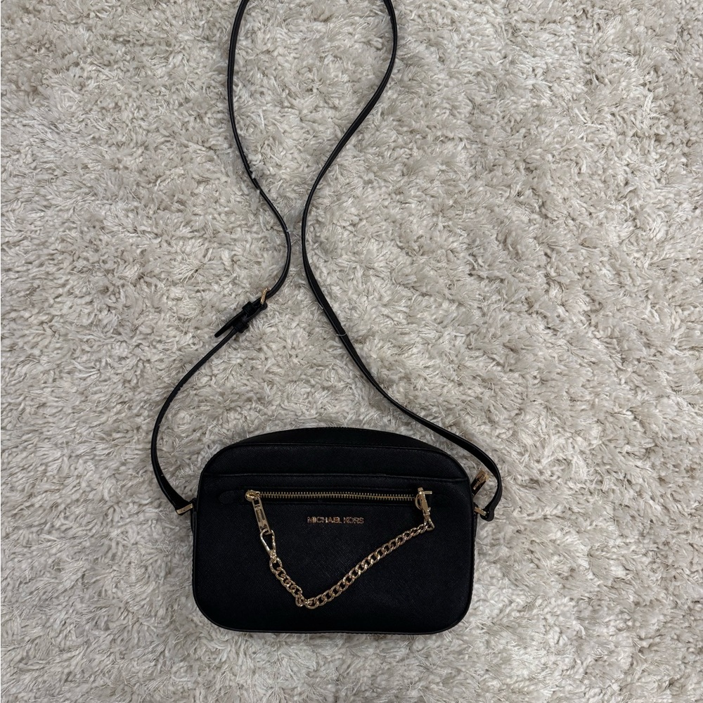 Michael Kors Black and Gold Crossbody Bag with Sleek Design